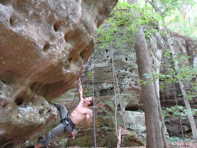 Rob Smith starting up the powerful arete of Wrecking Ball 12c, Jackson Falls, IL.