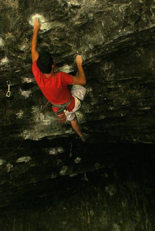 last move of the crux on The Burning 8a, Hells cave, American Fork canyon