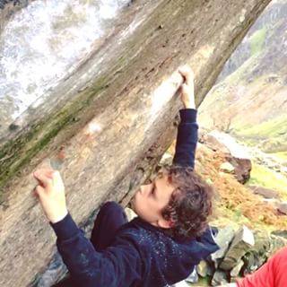 Me on Lizard King 7C in the llanberis pass.